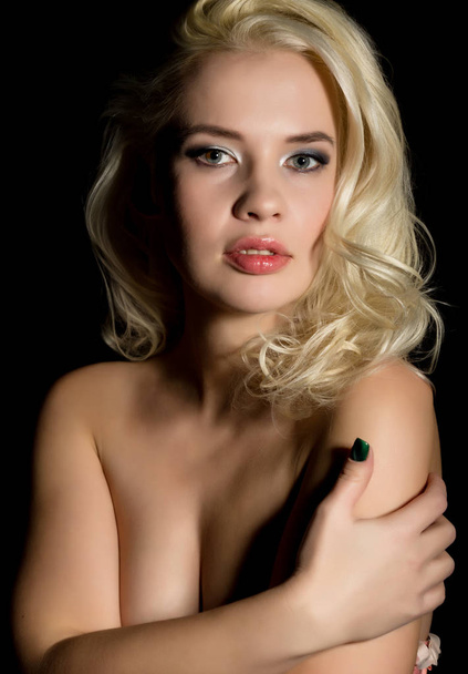 Beautiful sexy blond bride woman with professional make-up, on a dark background - Foto, Imagen