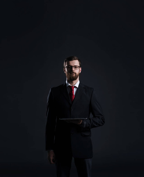 young businessman in black suit - Zdjęcie, obraz
