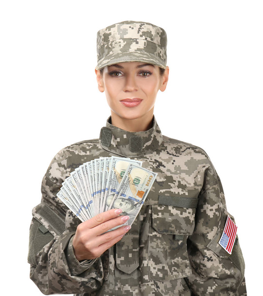 Female soldier with dollar banknotes on white background - Foto, imagen