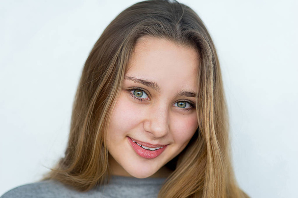Teenager girl posing on white background isolated - Фото, изображение