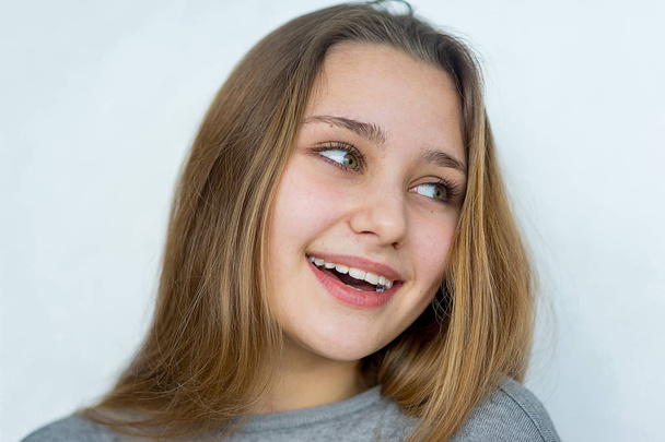 Teenager girl posing on white background isolated - Fotografie, Obrázek