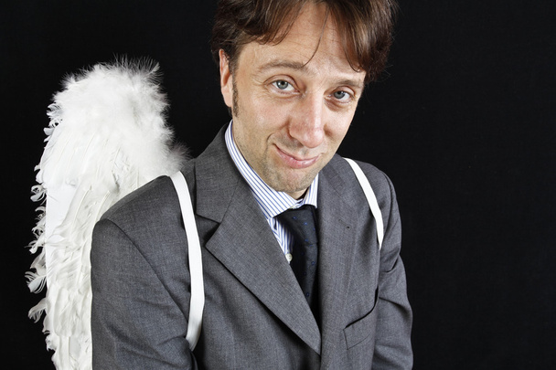 Businessman with angel wings - Photo, image