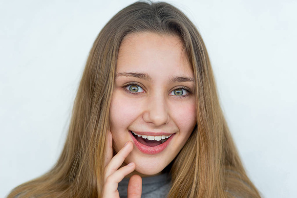 Teenager girl posing on white background isolated - Фото, изображение