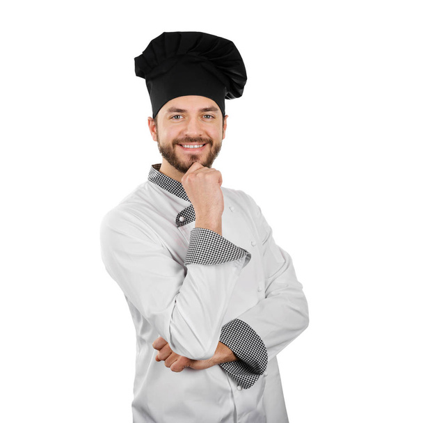 szczęśliwy, uśmiechnięty kucharz z ręki na podbródek na białym tle - Zdjęcie, obraz