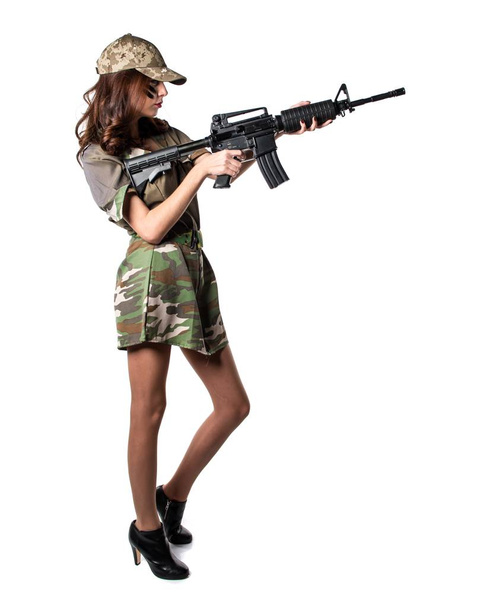 Military woman holding a rifle - Foto, Imagen