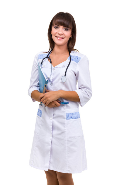Portrait of young doctor or medic with clipboard and stethoscope - Foto, afbeelding