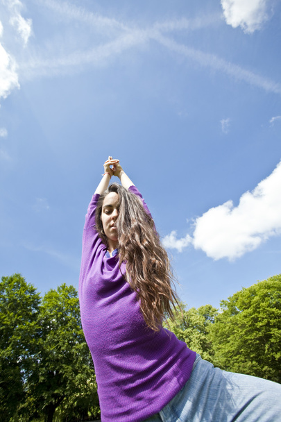 young girl dancing happy in a park - Foto, imagen