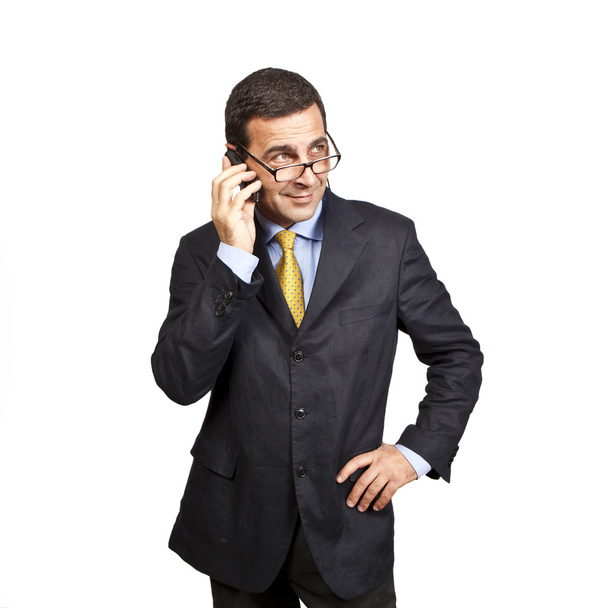 Portrait of confident businessman talking at the phone - Foto, Imagen