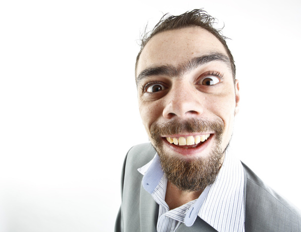 crazy young businessman facial expressions - Fotografie, Obrázek