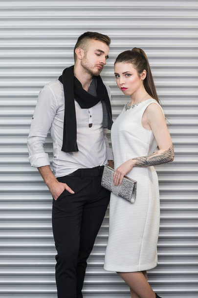 Fashion style photo of a beautiful couple - Фото, изображение
