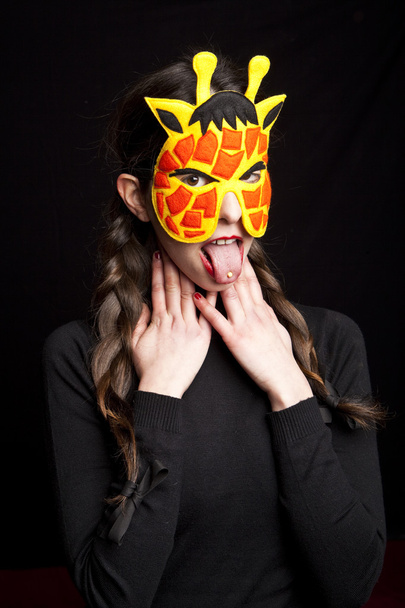 mysterious woman with carnival giraffe mask - Fotoğraf, Görsel
