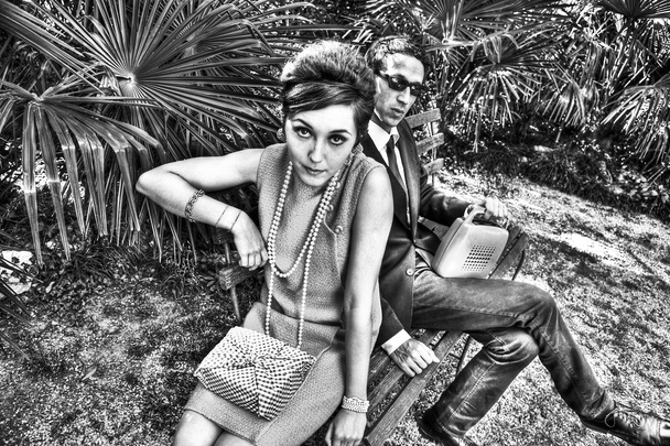 Fashion portrait of retro sixties style young couple - Photo, Image