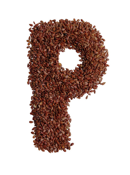 Letter p made with Linseed also known as flaxseed isolated on wh - 写真・画像