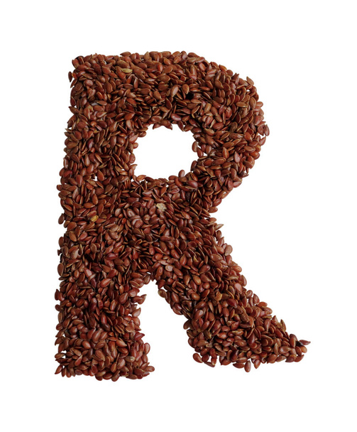 Letter R made with Linseed also known as flaxseed isolated on wh - Φωτογραφία, εικόνα