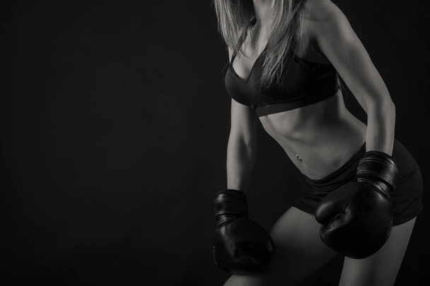 figure fitness girl on a black background - Photo, image