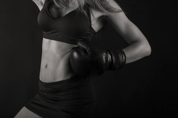 figure fitness girl on a black background - Photo, image