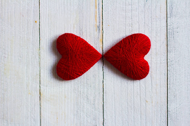 Love hearts on wooden texture background, valentines day card concept. - Photo, Image