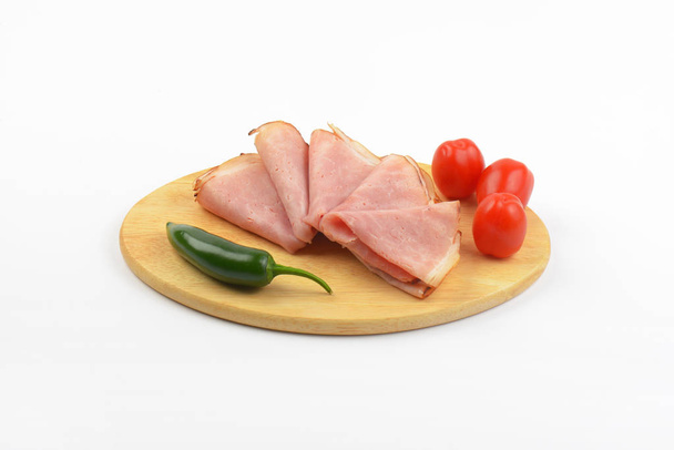 ham with cherry tomatoes and chili pepper - Photo, Image