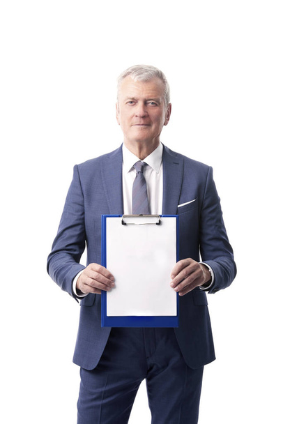 professional man holding clipboard - Foto, immagini