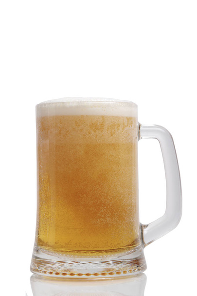large mug of light beer with foam on white background - Valokuva, kuva