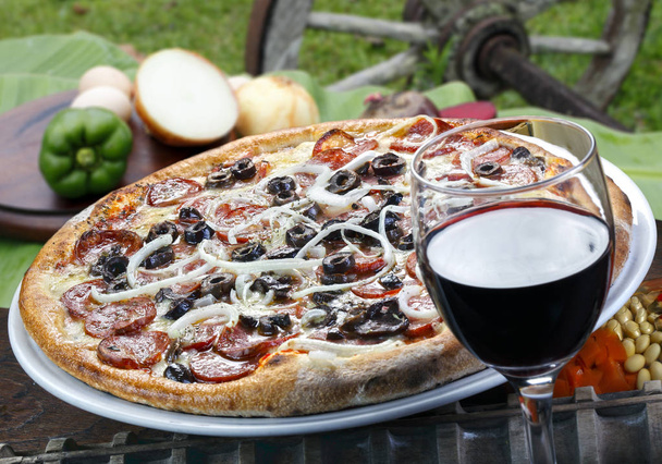 Pizza with glass of wine - Φωτογραφία, εικόνα