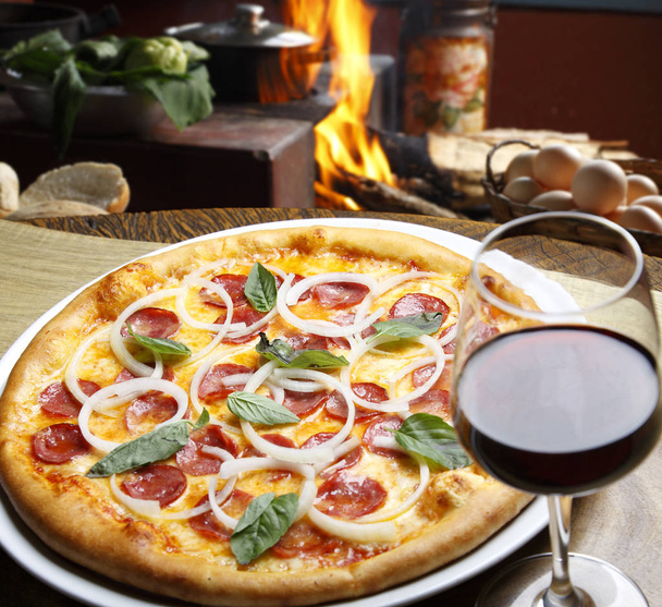 Pizza with glass of wine - Photo, image