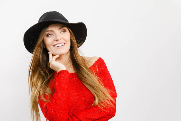 Smiling pretty girl with brown hair and black hat. - Fotoğraf, Görsel