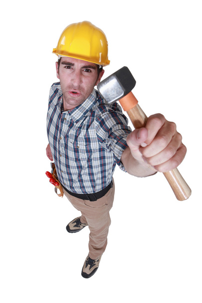 Builder holding hammer - Fotoğraf, Görsel