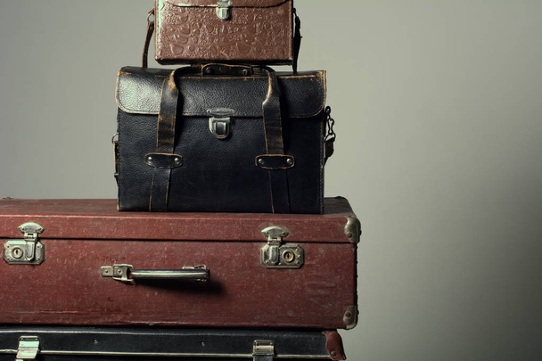 Background stack of old suitcases form a tower - Photo, Image