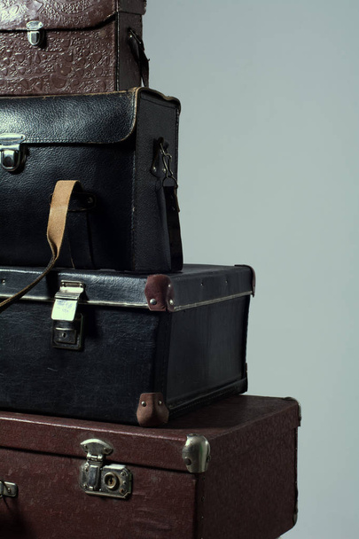 Background stack of old shabby suitcase - Photo, Image