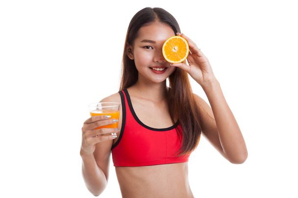 Beautiful Asian healthy girl with orange juice and orange fruit. - Φωτογραφία, εικόνα