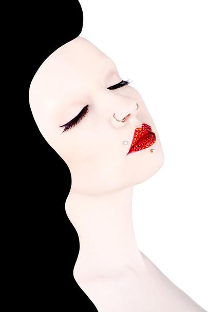Beautiful girl with red rubies on the lips - Zdjęcie, obraz