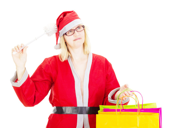 Babbo Natale con sacchetti e scopino
 - Foto, immagini