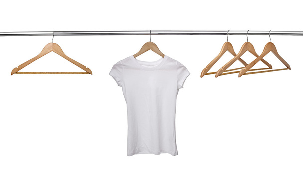 white t shirt on cloth hangers - 写真・画像
