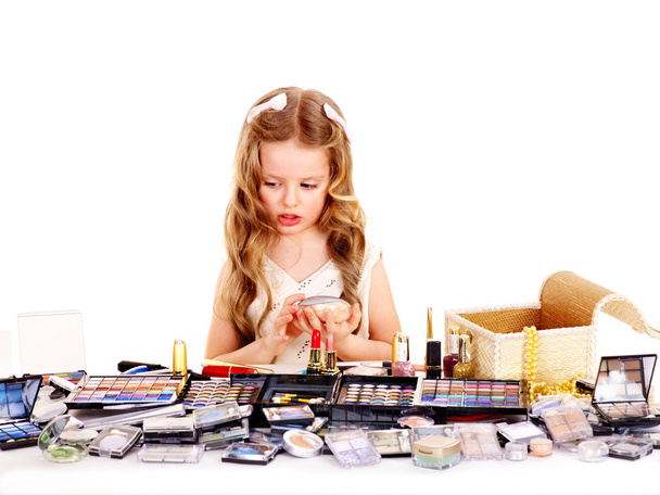 Little girl with child cosmetics. - Foto, Bild