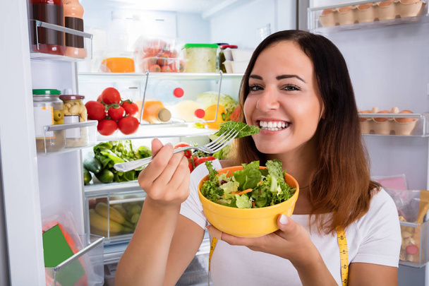Woman Eating Salad  - 写真・画像