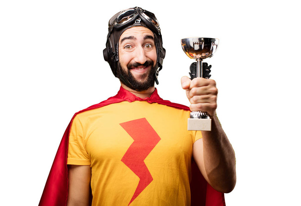 crazy super hero with sport cup - 写真・画像