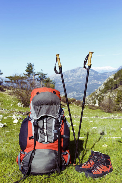 Backpack in the mountains with views of the mountains.  - 写真・画像