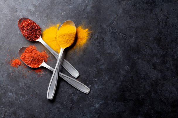 Colorful spices in spoons - Φωτογραφία, εικόνα