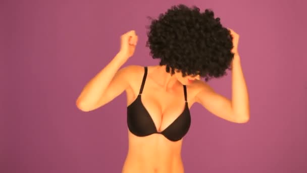 Woman with afro dancing in black underwear - Footage, Video
