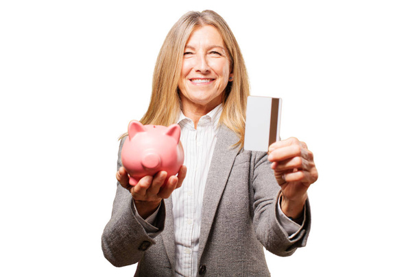 woman with piggy bank and credit card - Fotoğraf, Görsel