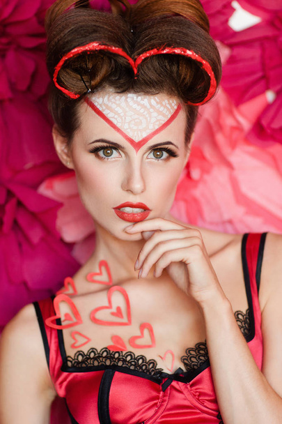 Sensual woman with valentine holiday makeup - 写真・画像
