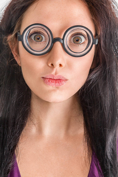 Woman portrait in crazy glasses - Foto, Imagen