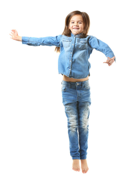 Cheerful little girl jumping  - Foto, imagen