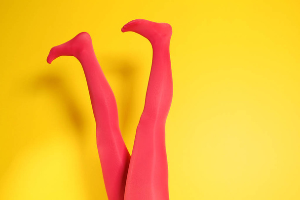 woman legs in color tights - Фото, изображение