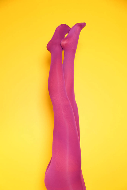 woman legs in color tights - Foto, imagen