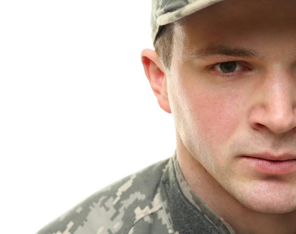 Soldier in camouflage on white   - Valokuva, kuva