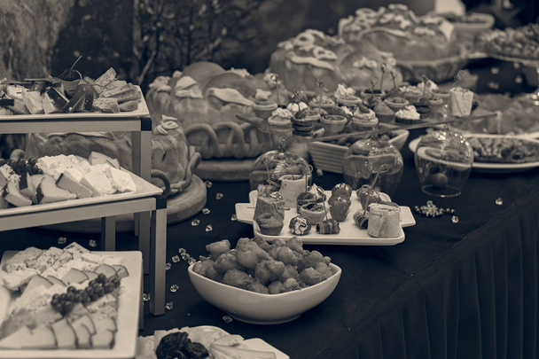 decorated Swedish table with a variety of good food, note shallow depth of field - Photo, Image