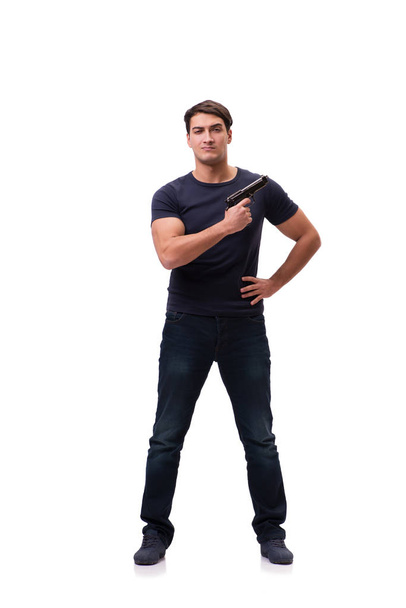 Aggressive young man with gun isolated on white - Photo, Image