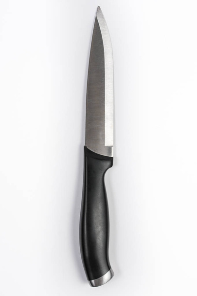 Pieni keittiö leikkaus veitsi eristetty valkoisella taustalla
 - Valokuva, kuva
